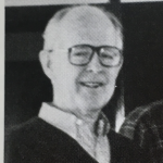 Man wearing glasses, black and white